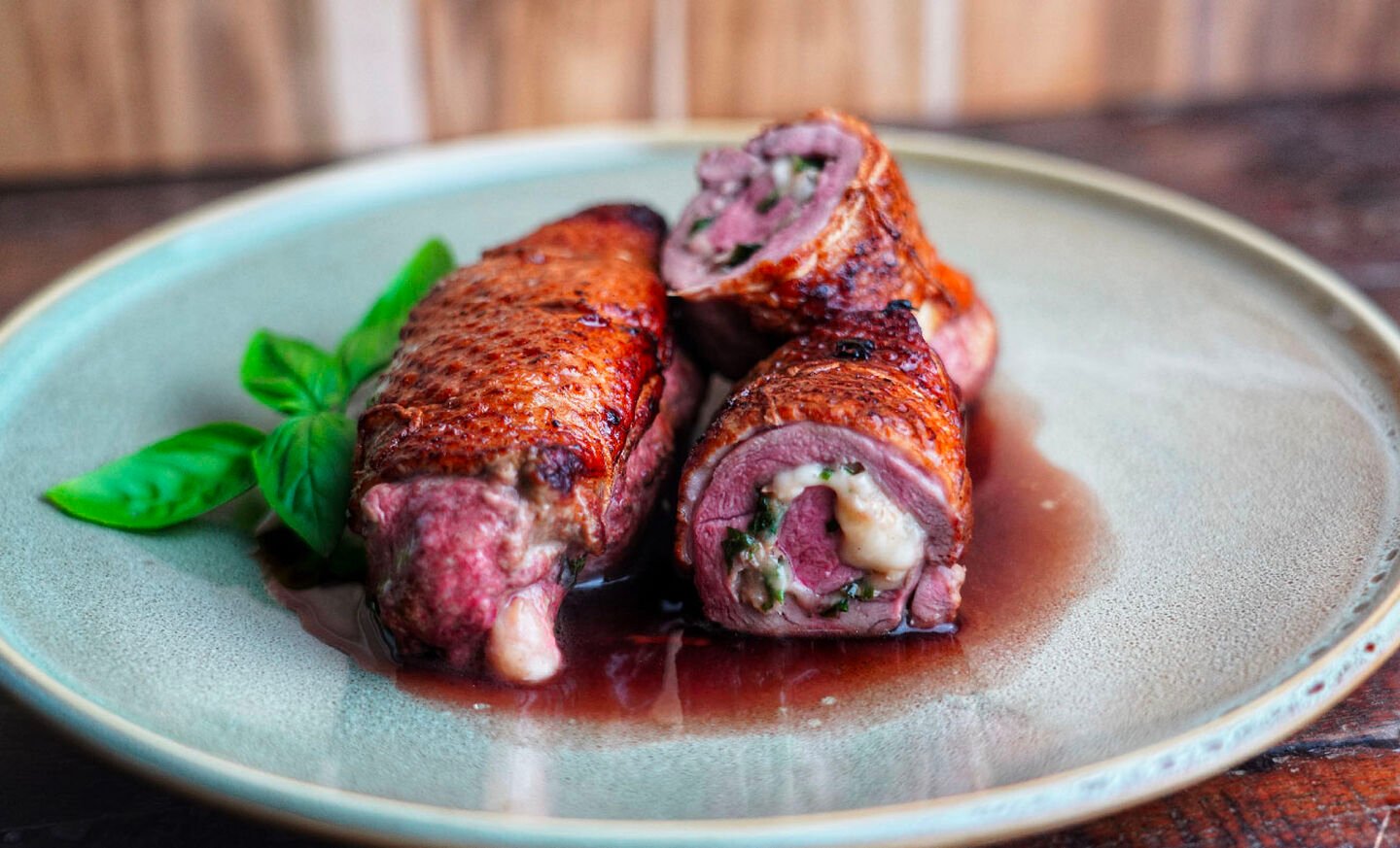 Muscovy Duck Roulade with Smoked Mozzarella and Roasted Garlic