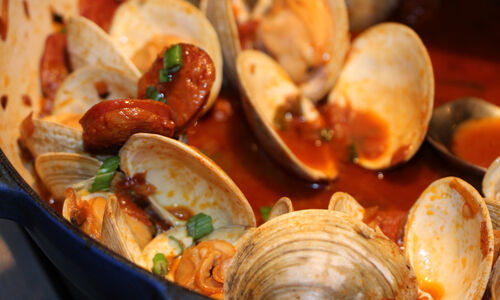 Chorizo and Little Neck Clams in a Spicy Seafood Broth